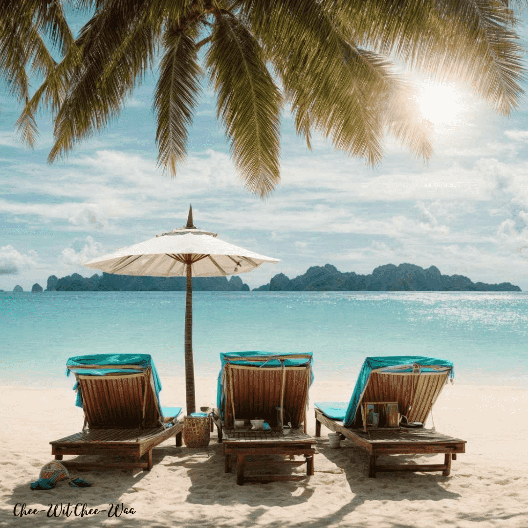 3 sun loungers on a Thai beach